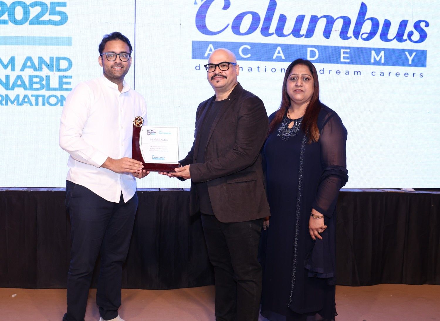 Chandrashekar Tripathi receiving an award